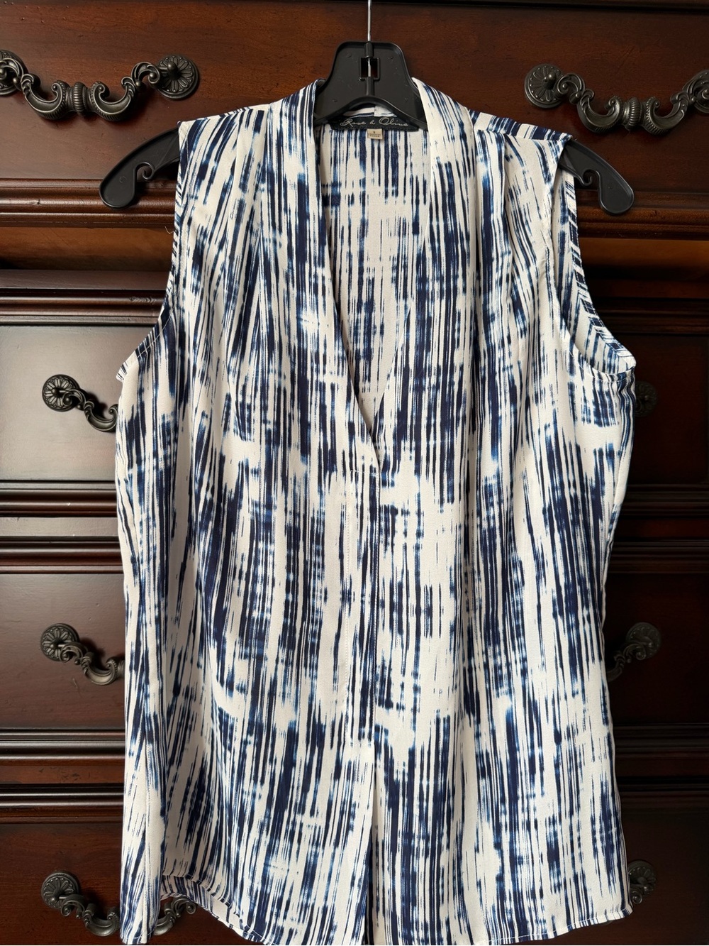 Rose & Olive Navy and White Sleeveless V-Neck Patterned Blouse